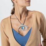Iconic white "Eye" necklace